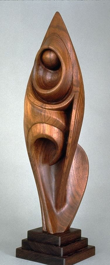 An organic Black Walnut wood Sculpture called Growth by Douglas Bechler